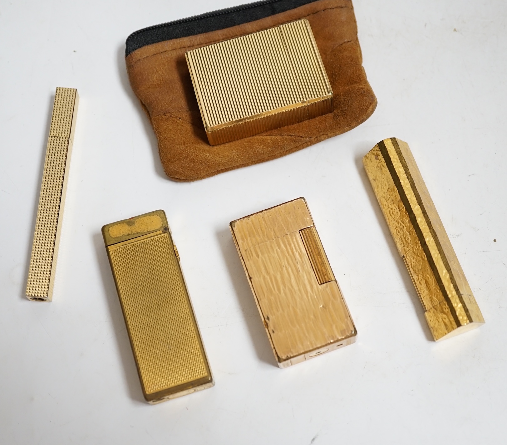 Two Dunhill gold plated lighters, a Dupont lighter and two others. Condition - fair, not working